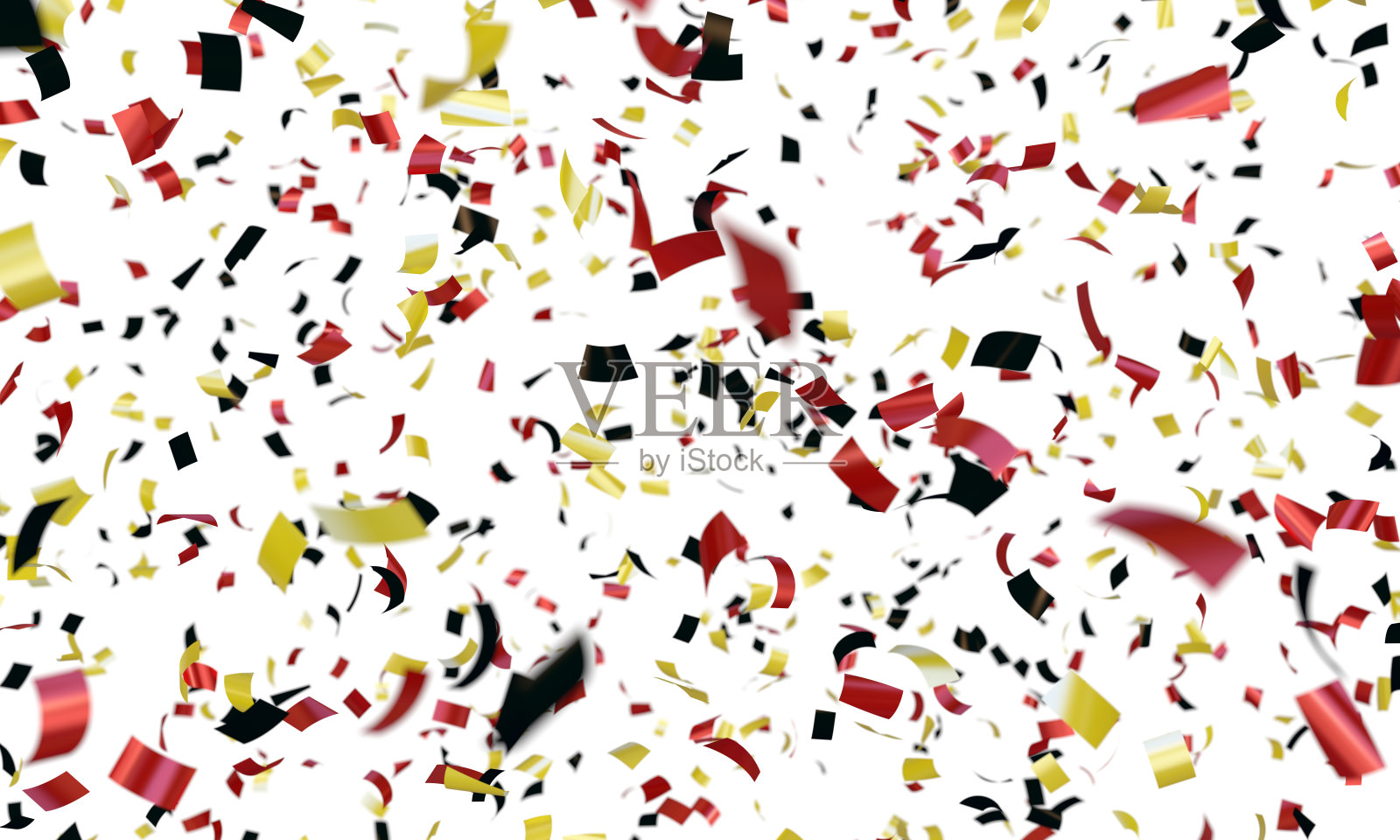 五彩纸屑红，黑，黄照片摄影图片