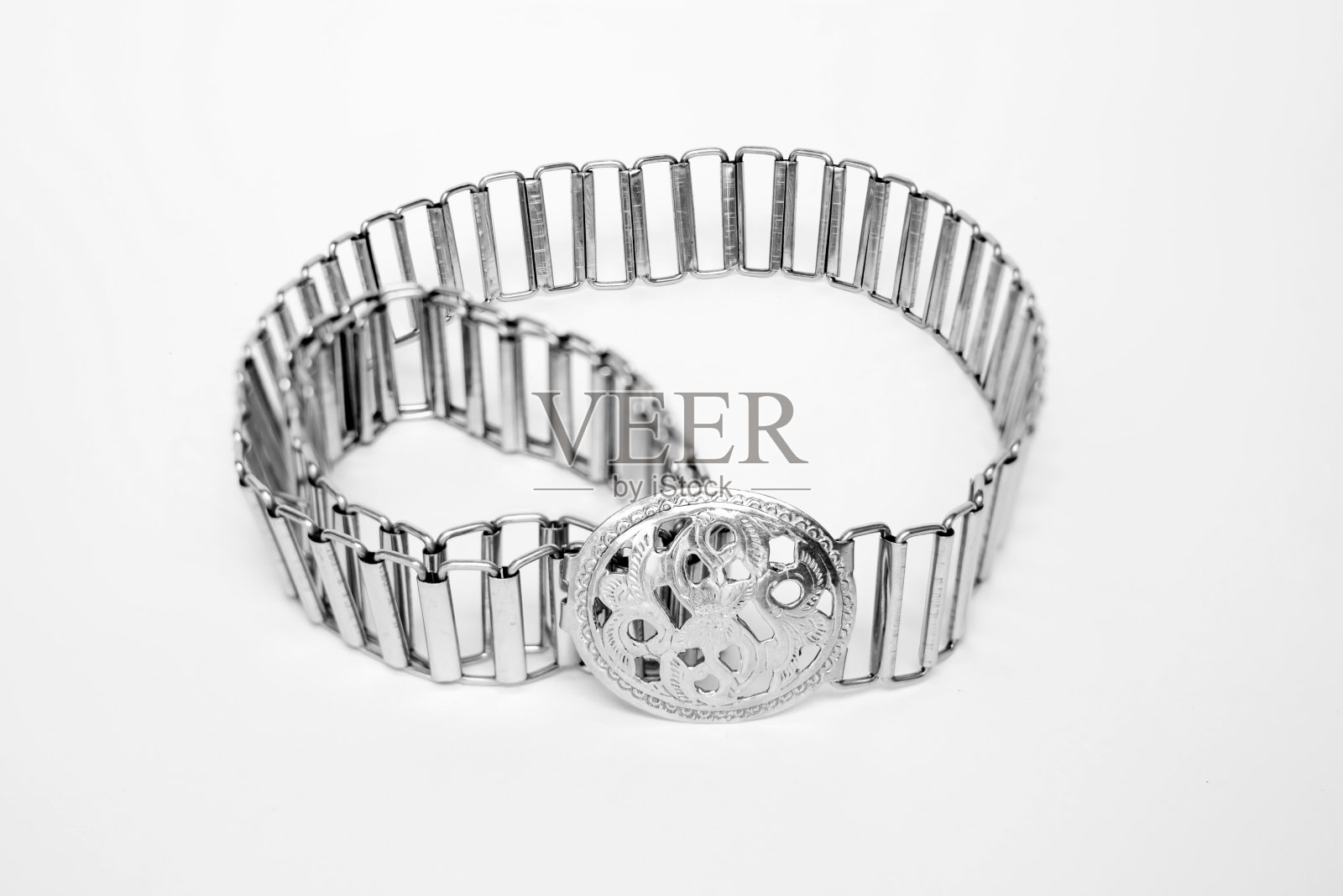 漂亮闪亮的银质手工腰带照片摄影图片