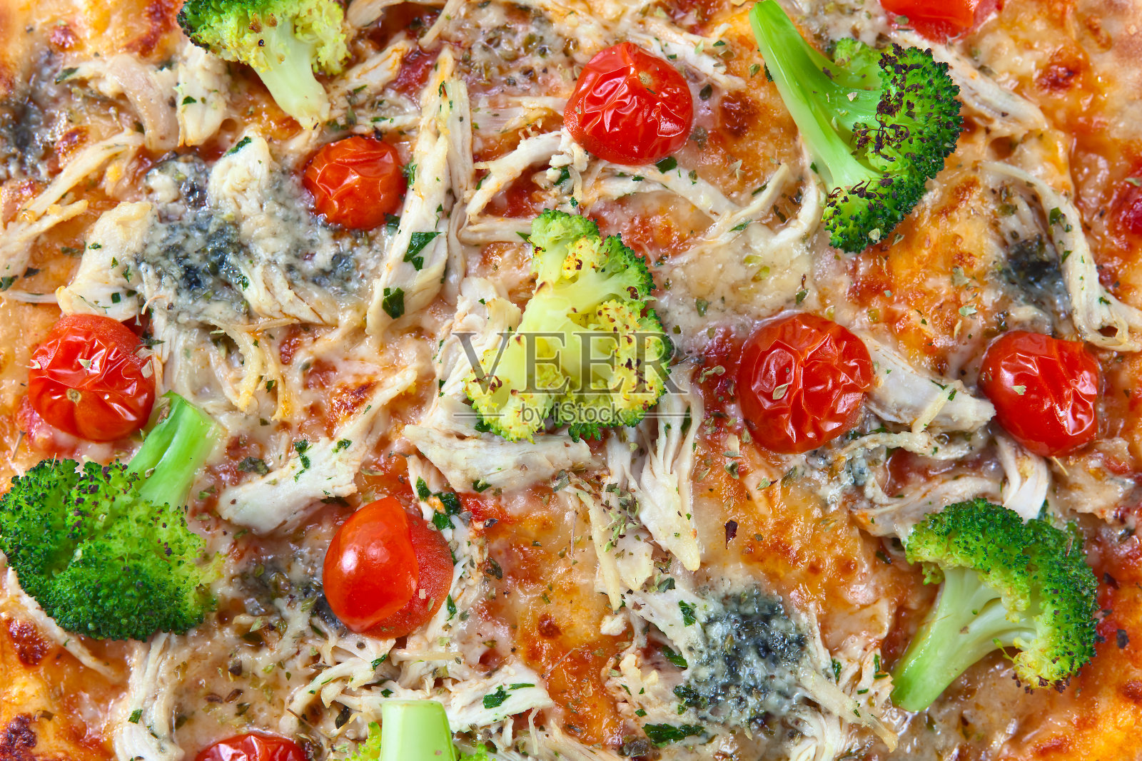 特写新鲜出炉的披萨照片摄影图片