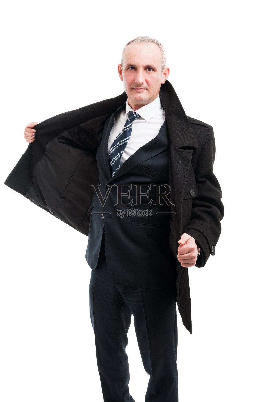 身着大衣摆姿势的中年绅士照片摄影图片