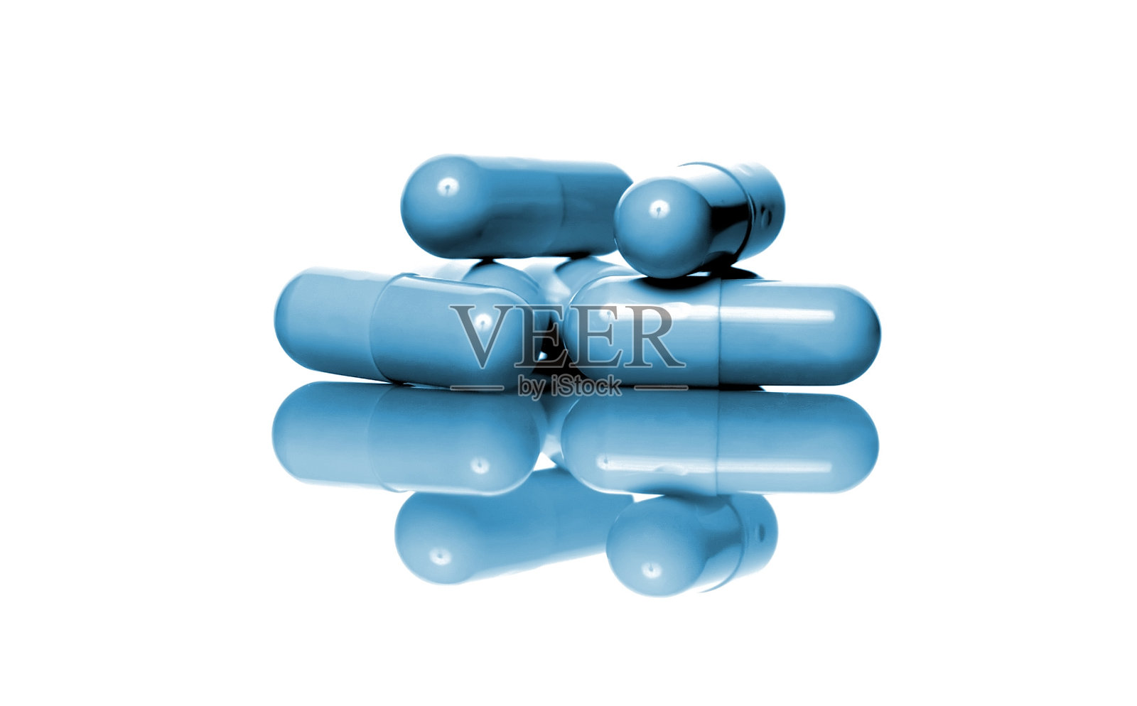 蓝色药丸孤立在白色之上照片摄影图片
