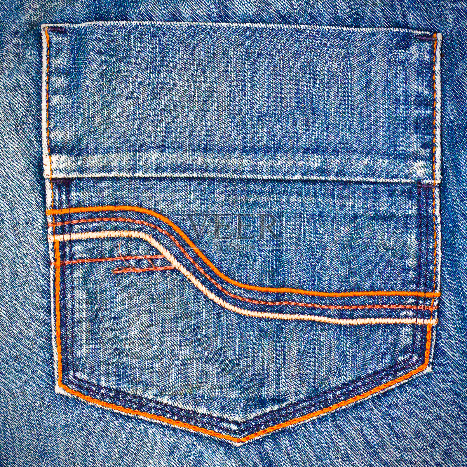 牛仔裤的口袋里照片摄影图片