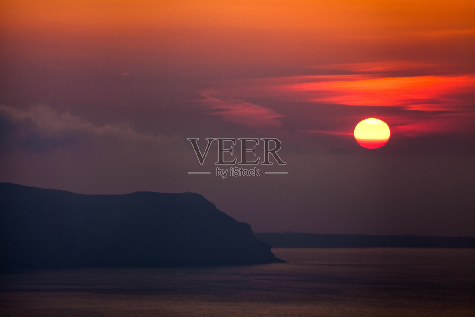 朦胧的日落在希腊群岛照片摄影图片