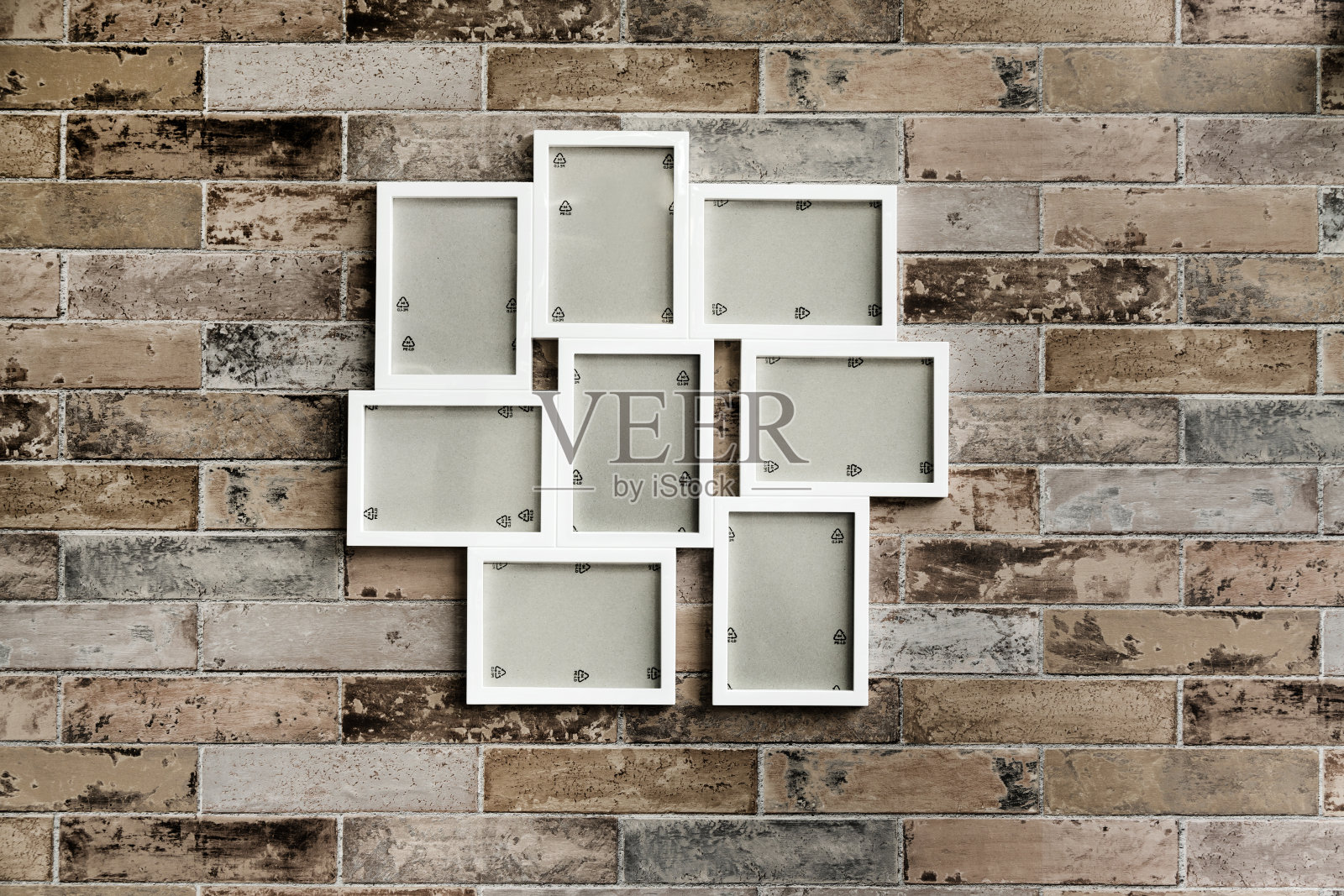 砖墙上的白色木框照片摄影图片