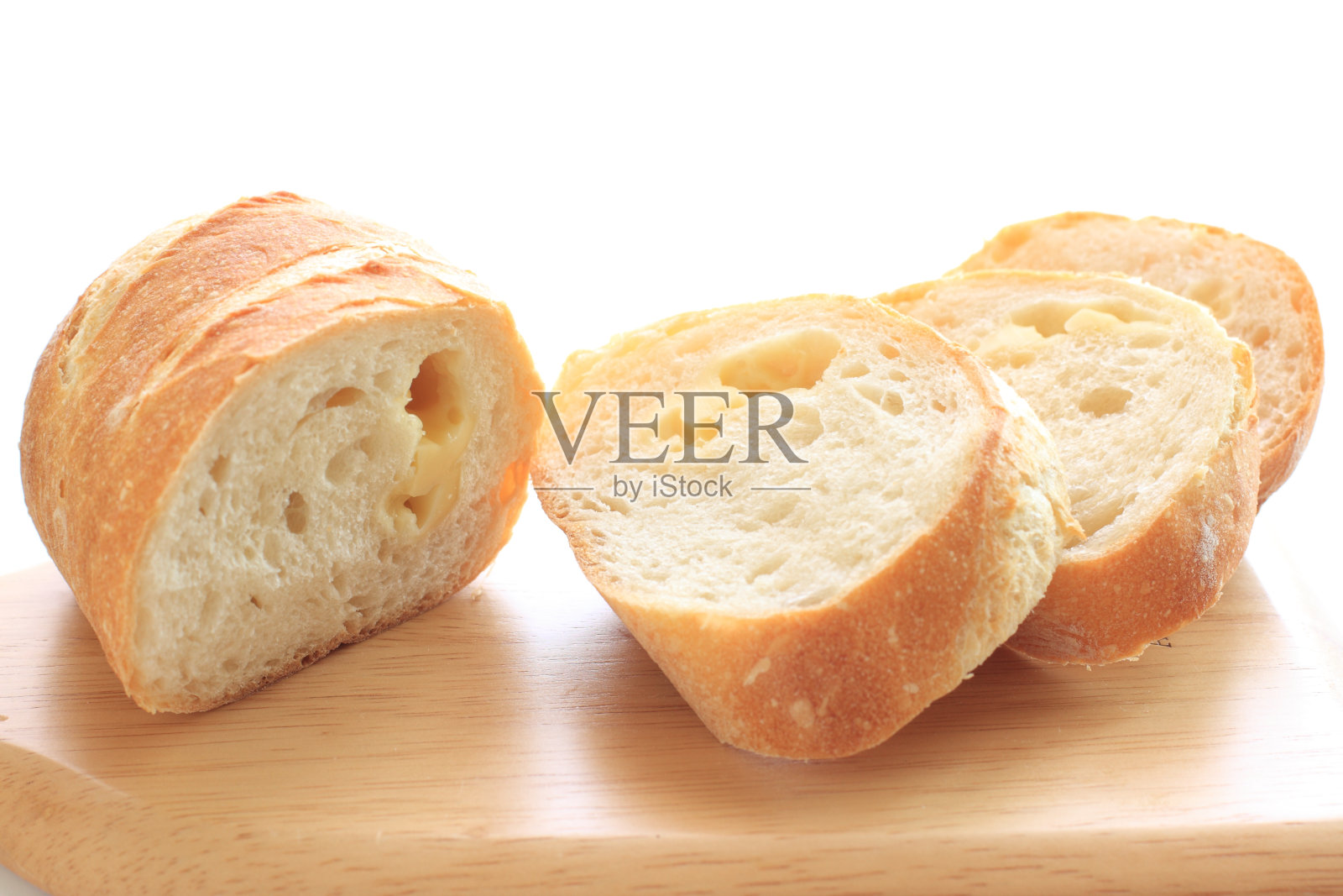 切菜板上的法式面包照片摄影图片