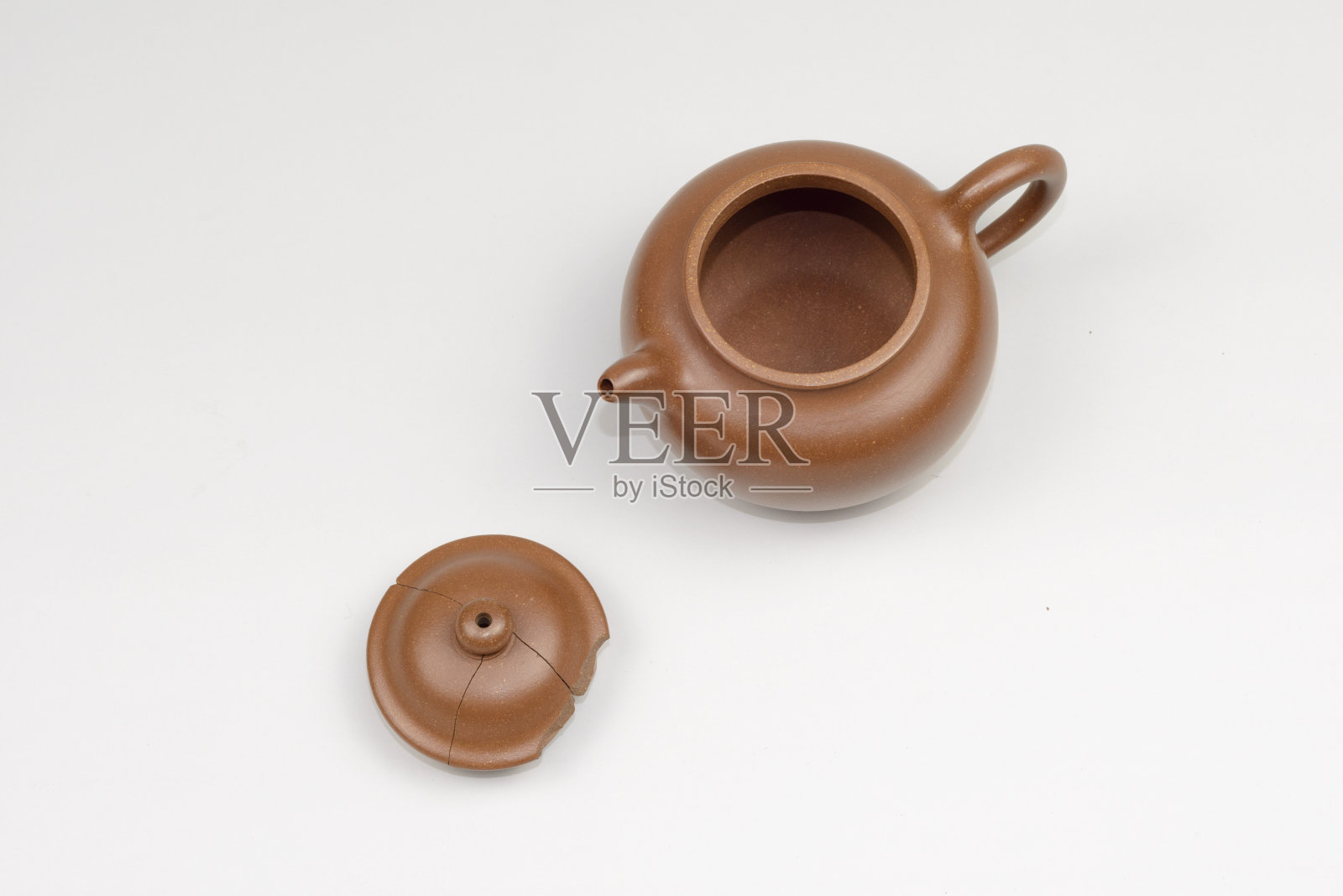 破碎的茶壶照片摄影图片