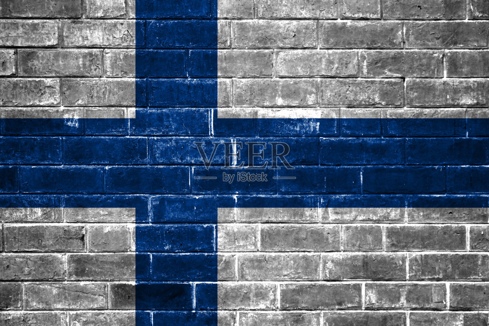 一面芬兰国旗被画在砖墙上照片摄影图片