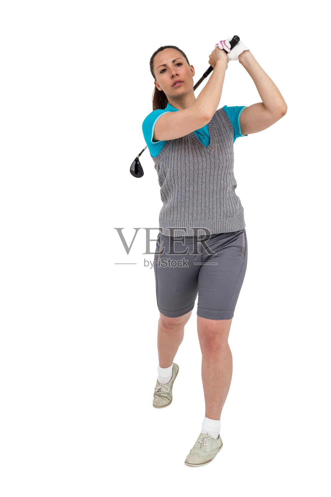 高尔夫球手击球照片摄影图片