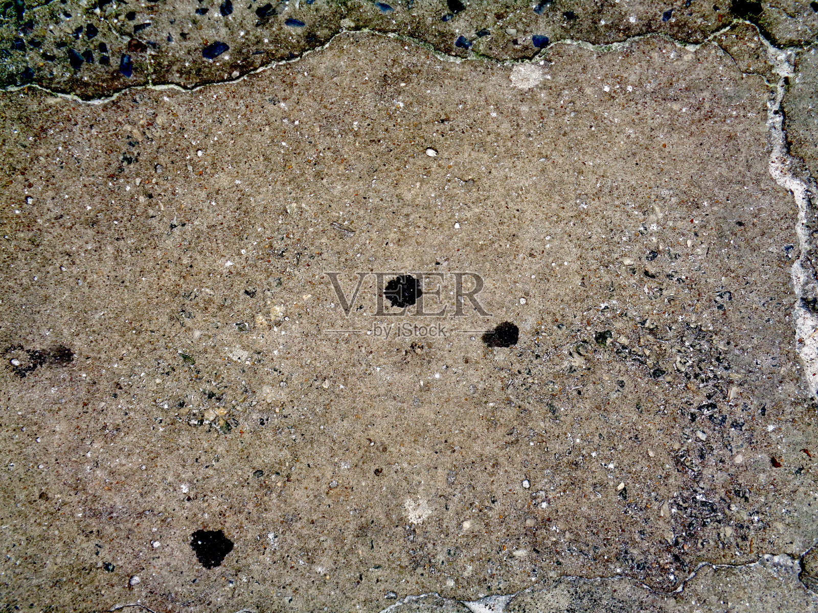 被口香糖破坏的人行道照片摄影图片