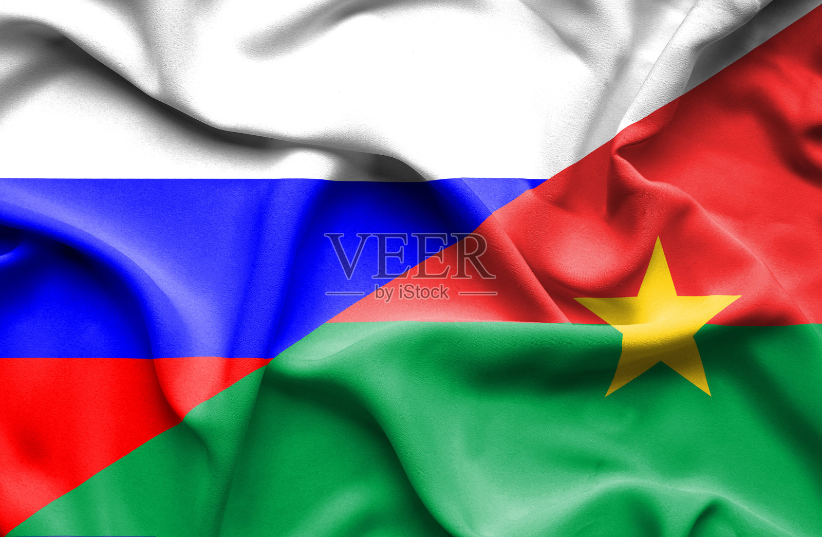 挥舞着布基纳法索和俄罗斯的旗帜照片摄影图片