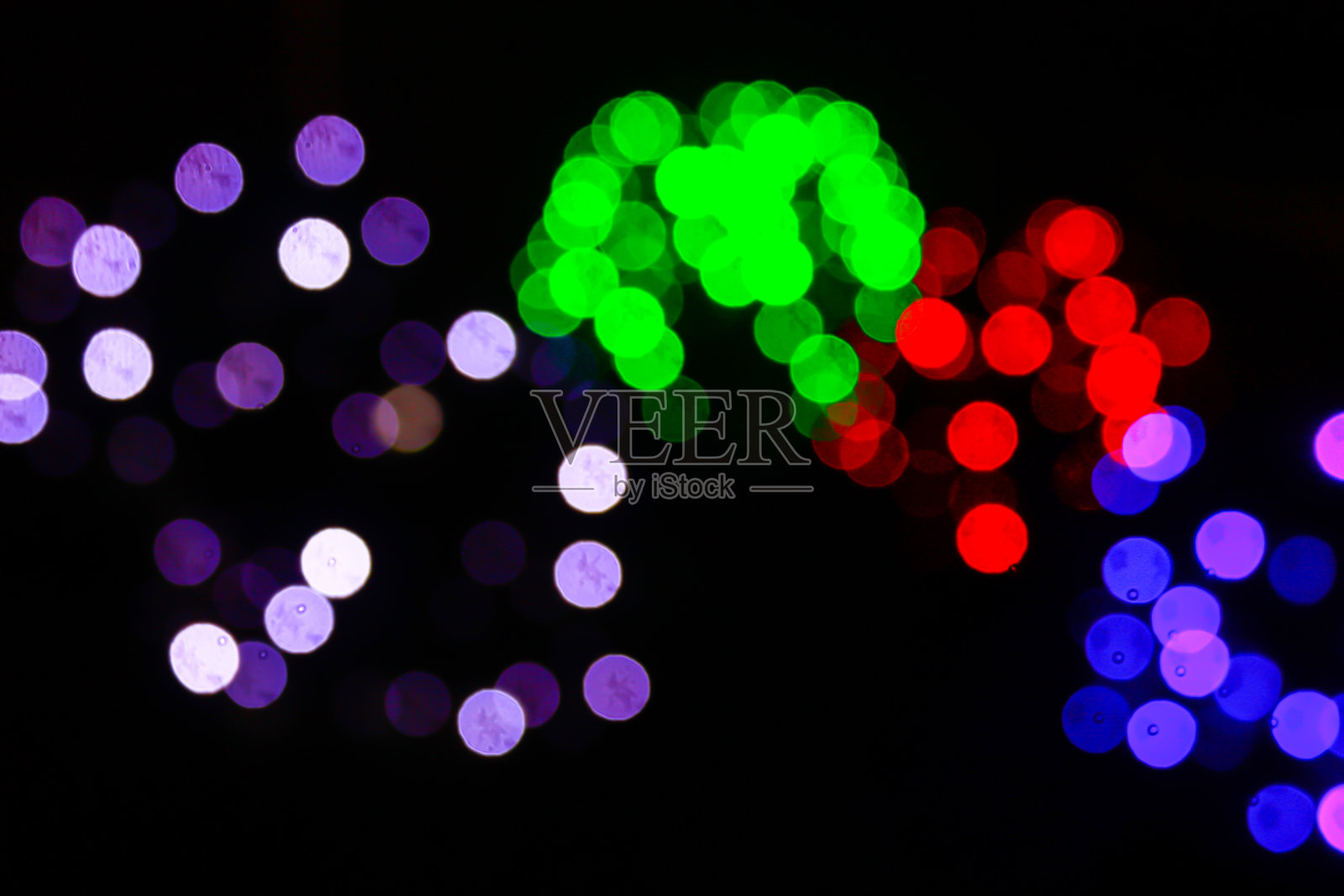 抽象的散景光背景。照片摄影图片