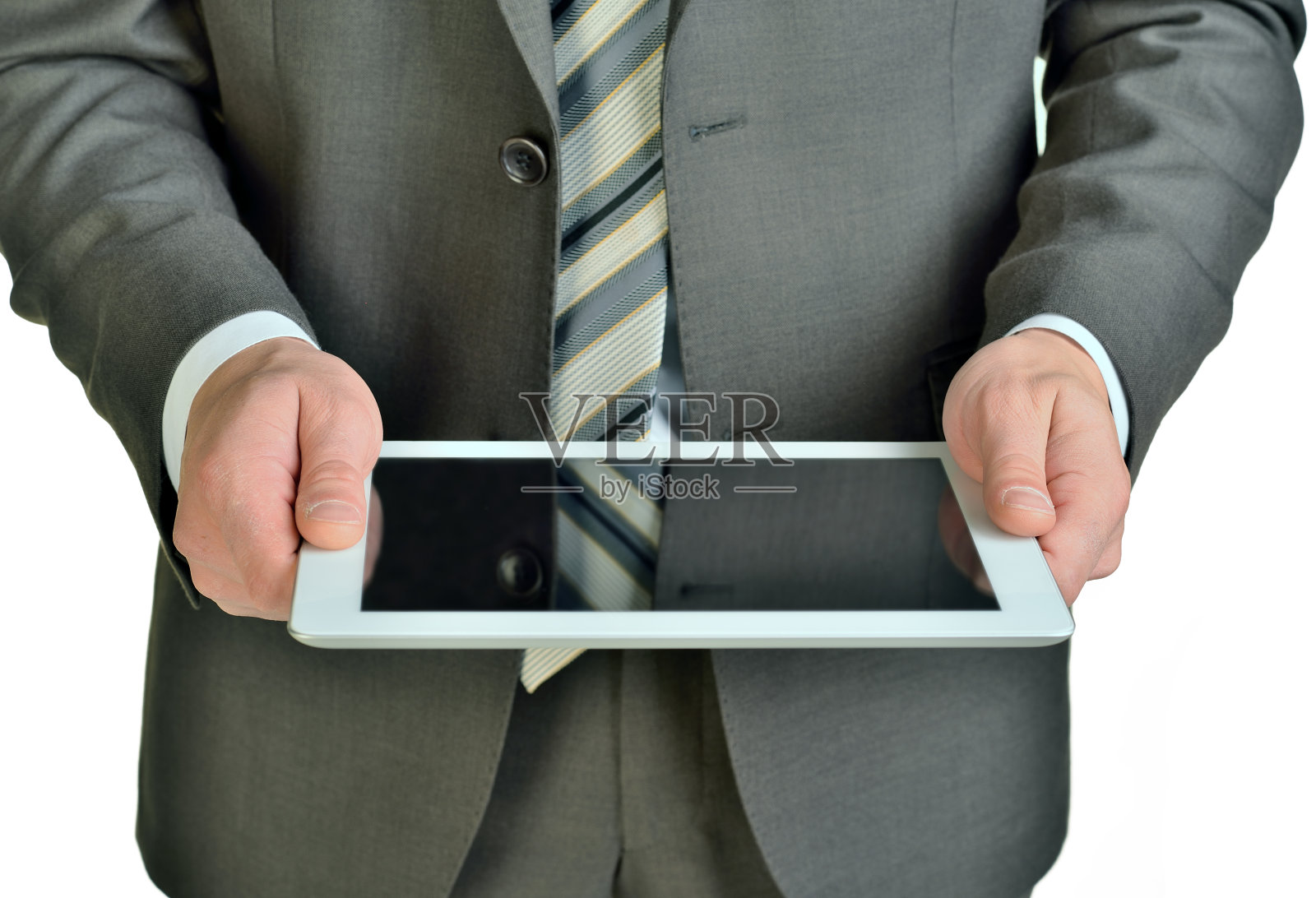商人拿着数字平板电脑，特写照片摄影图片