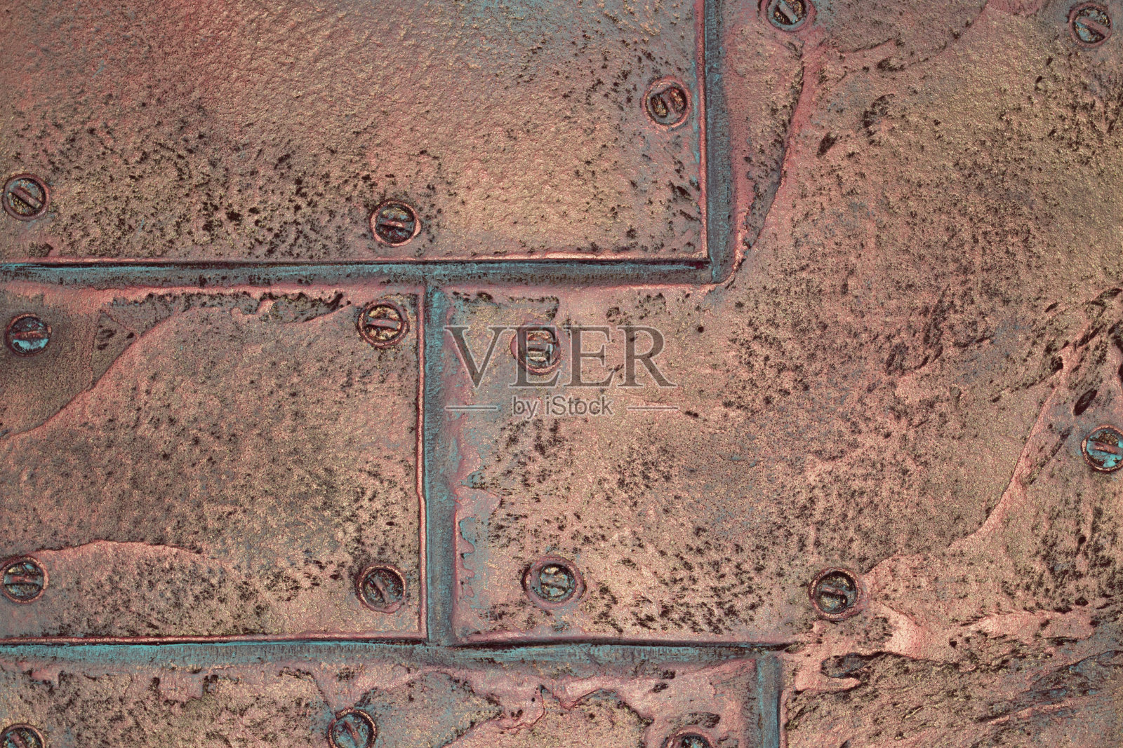 铆钉上的铜片。旧金属质感照片摄影图片