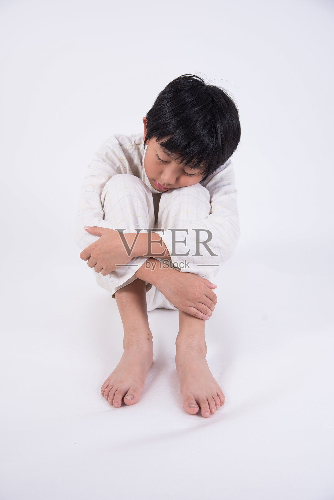 亚洲男孩睡觉照片摄影图片