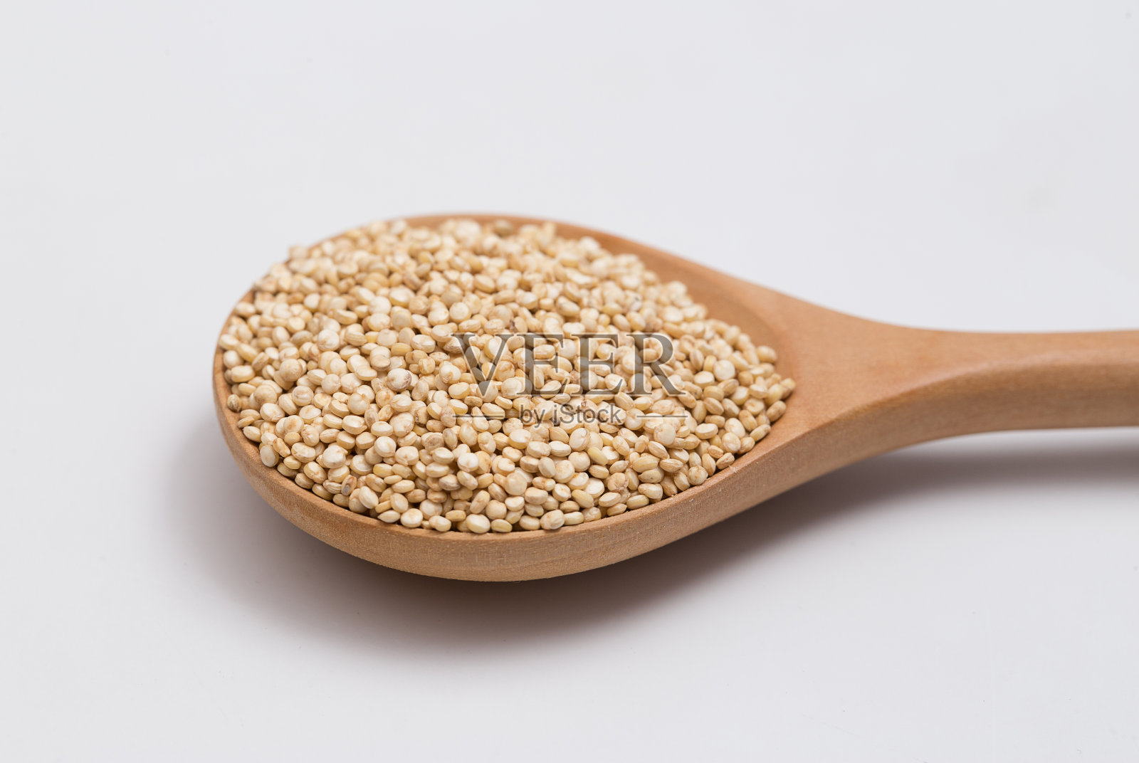 木勺里的藜麦种子照片摄影图片