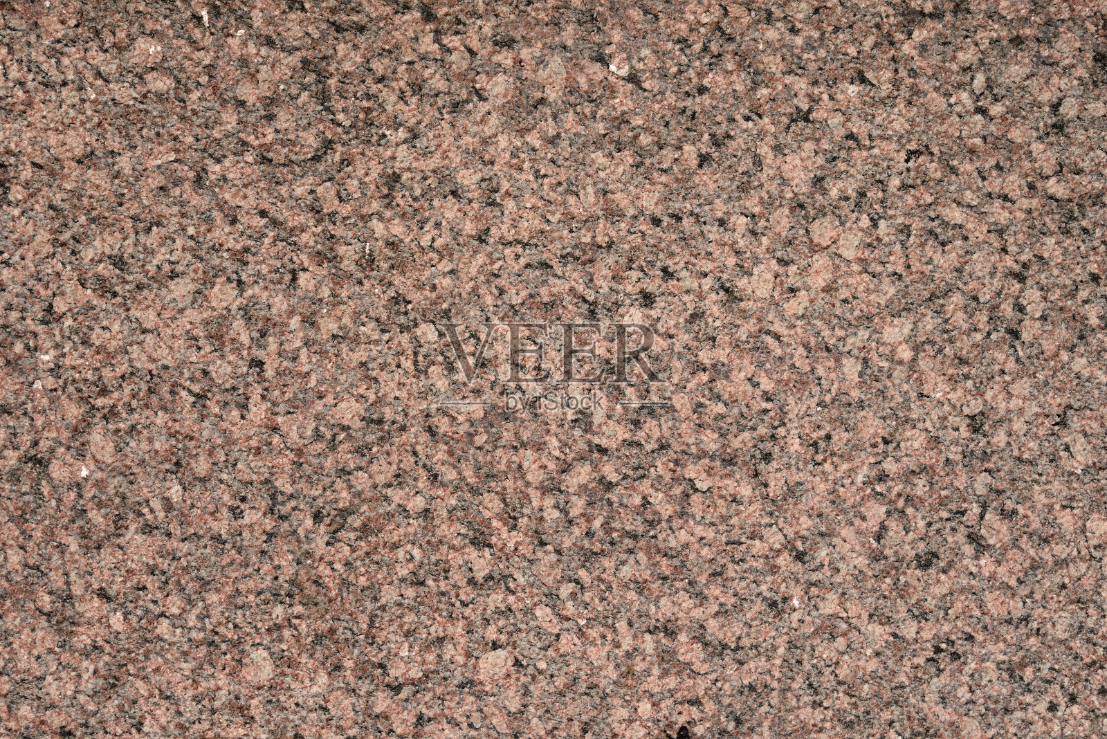 红色花岗岩的背景。照片摄影图片