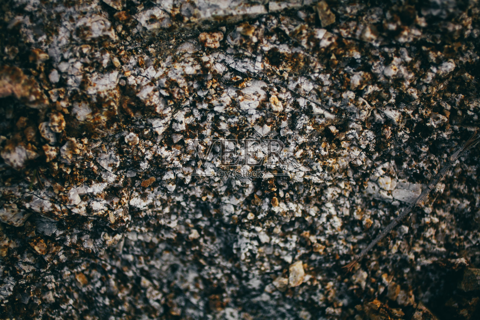 岩石纹理和背景。石头的背景。抽象的纹理和背景为设计师。抽象的石头纹理。近距离观看生锈的岩石。原石宏。自然的纹理。照片摄影图片