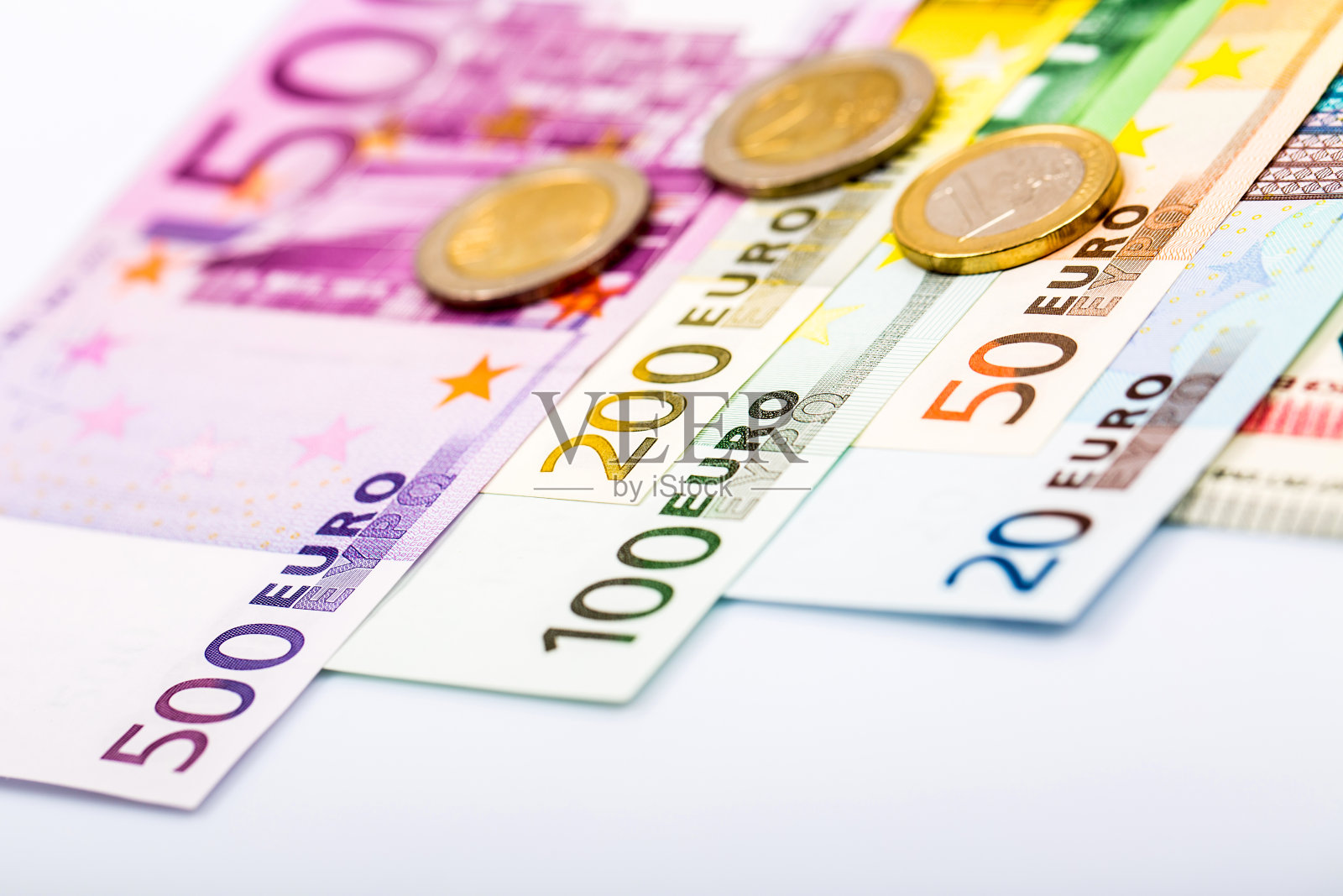 钞票和硬币的特写照片摄影图片