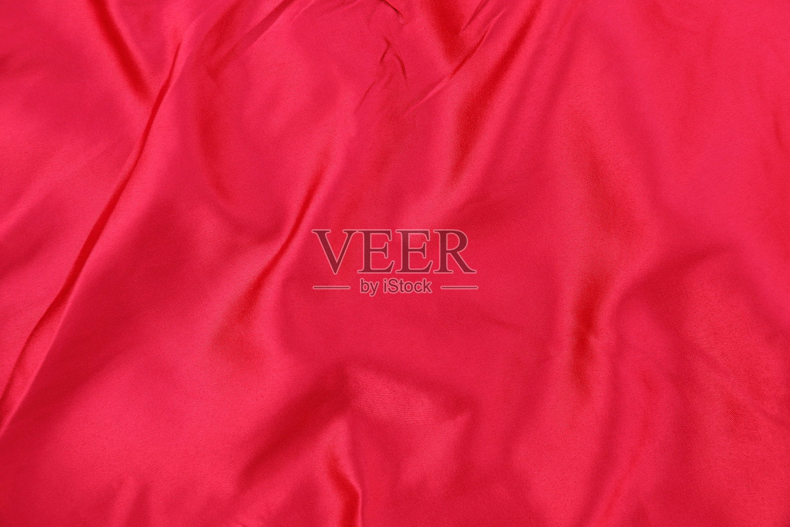 优雅的弯曲红色丝绸质地的背景和设计照片摄影图片