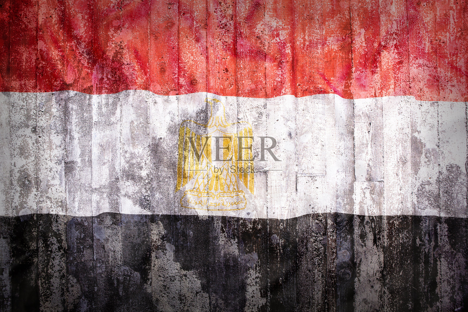 砖墙上埃及国旗的Grunge风格照片摄影图片