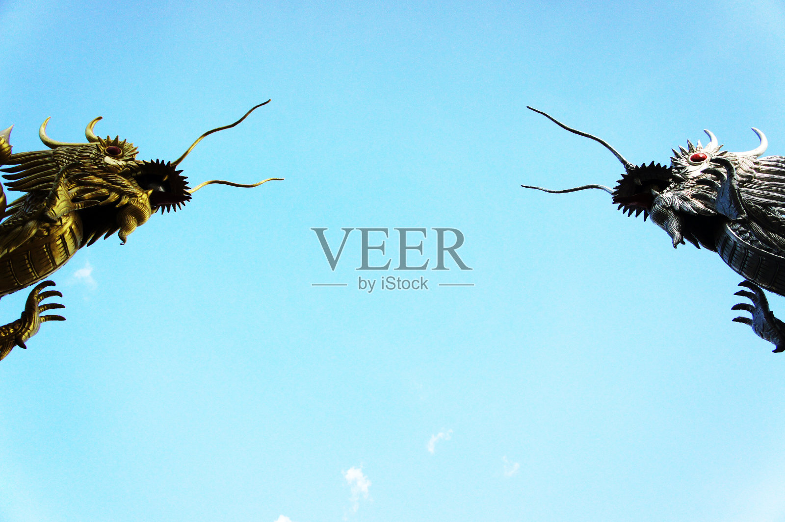 孪生龙雕像照片摄影图片