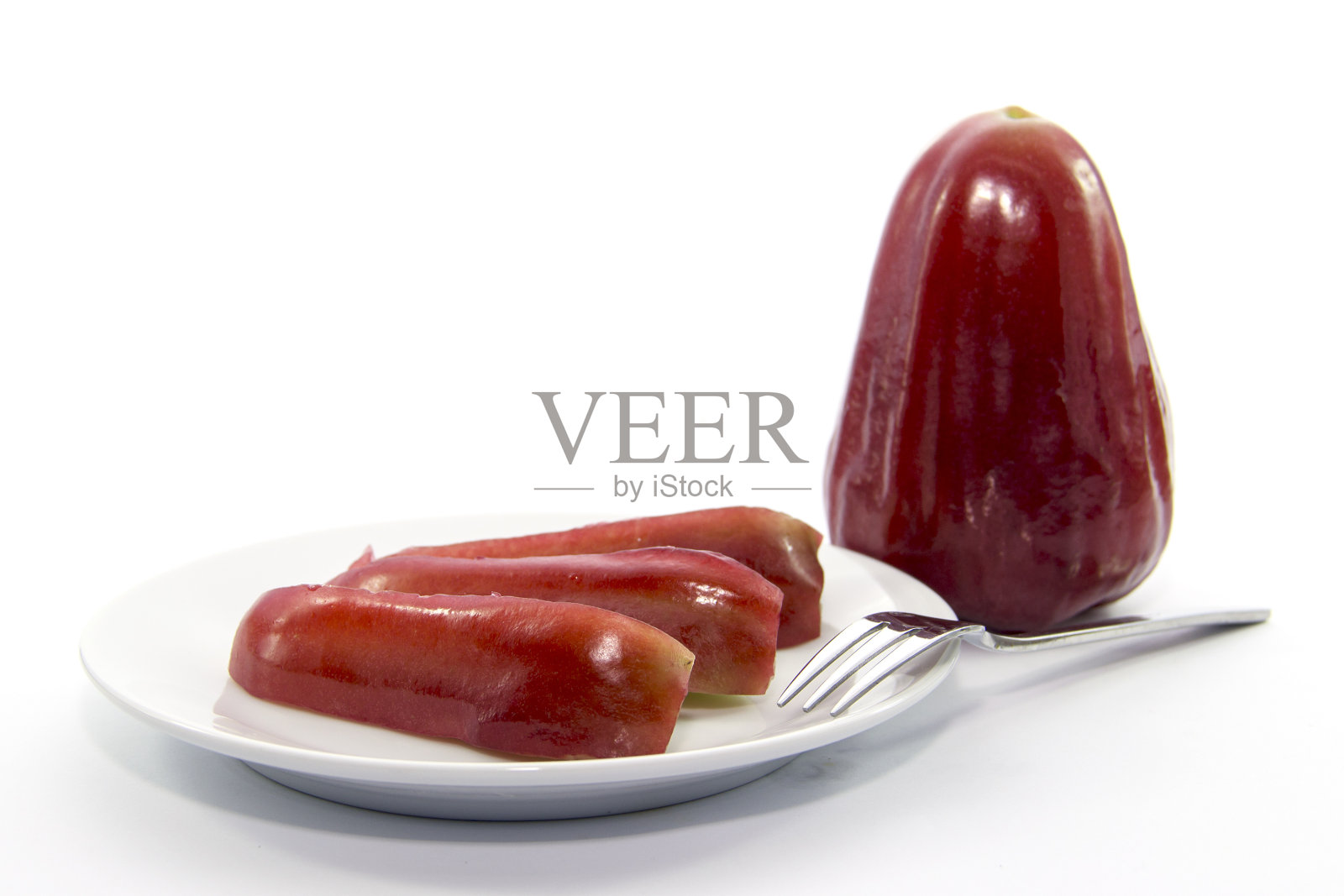 红玫瑰苹果零食片，生切片照片摄影图片