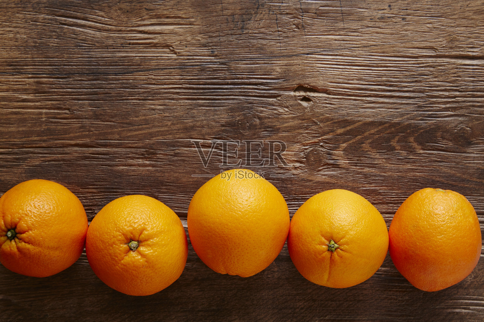 一排有机橙子照片摄影图片