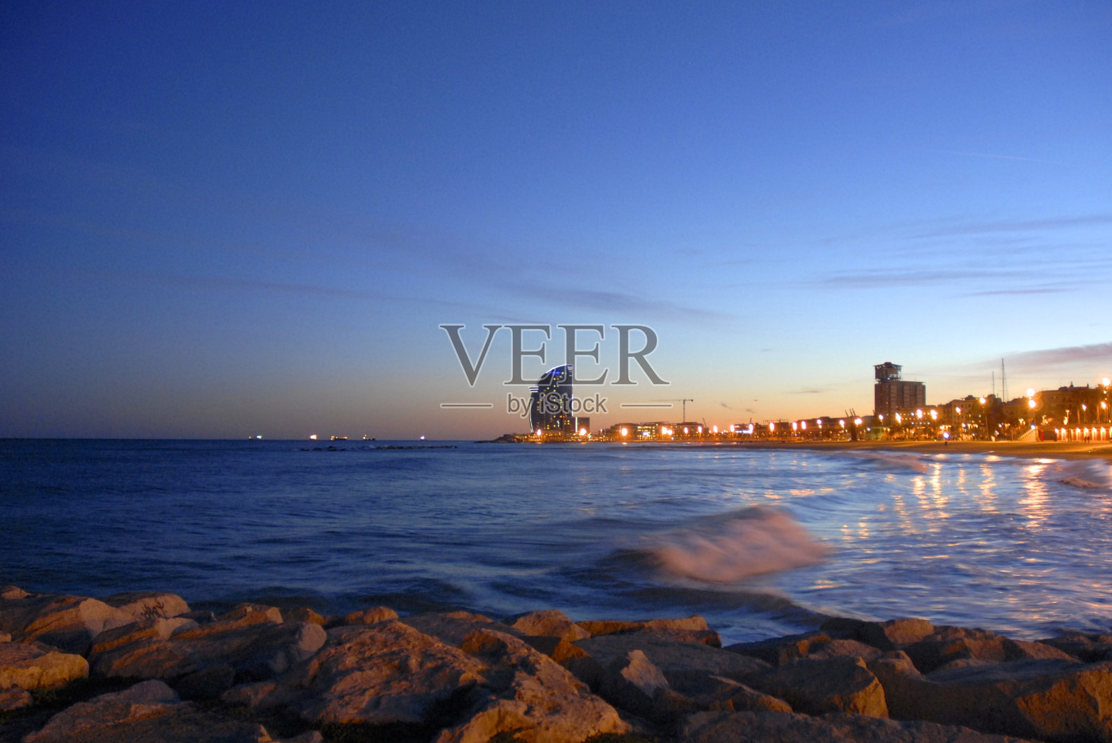 日落巴塞罗那照片摄影图片