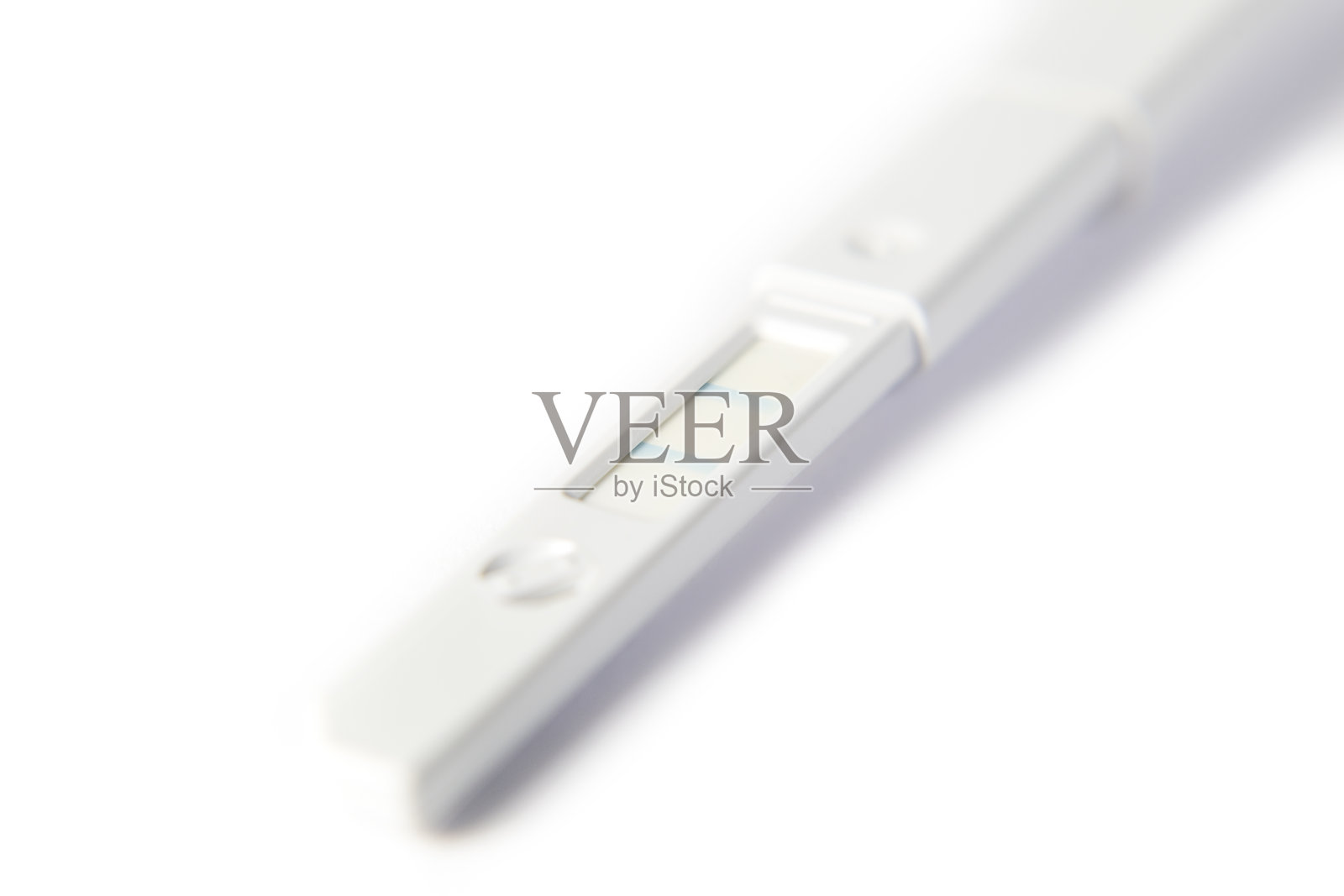 妊娠试验阳性，白色背景，特写照片摄影图片