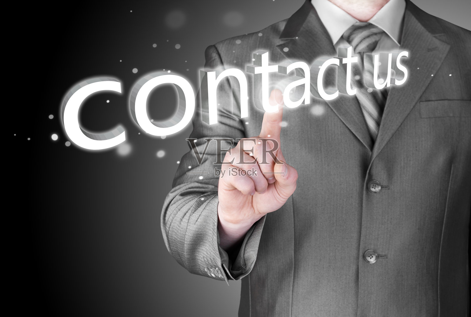 商人正在推“联系我们”的标志照片摄影图片