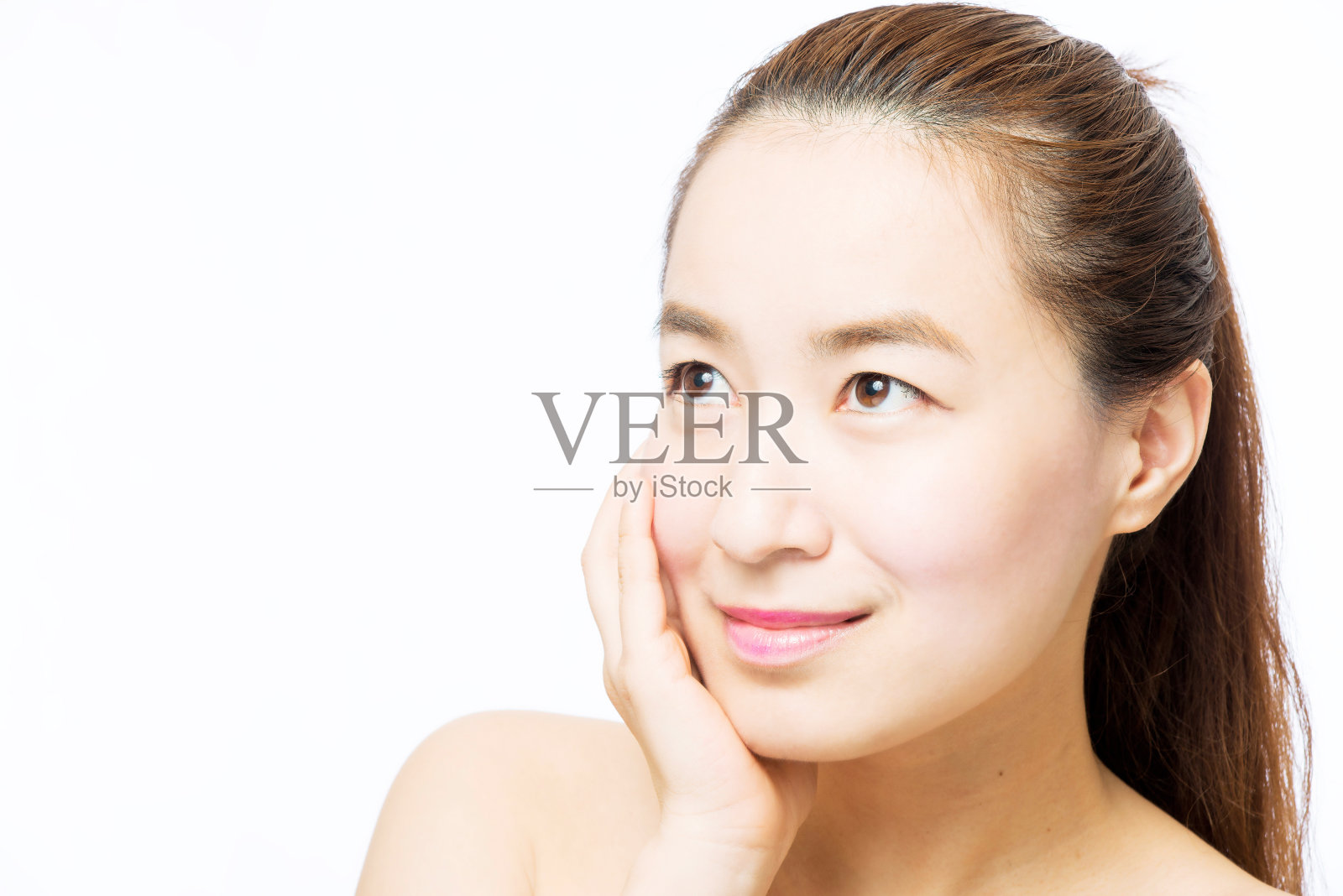 近距离的肖像美丽的年轻女子的脸照片摄影图片