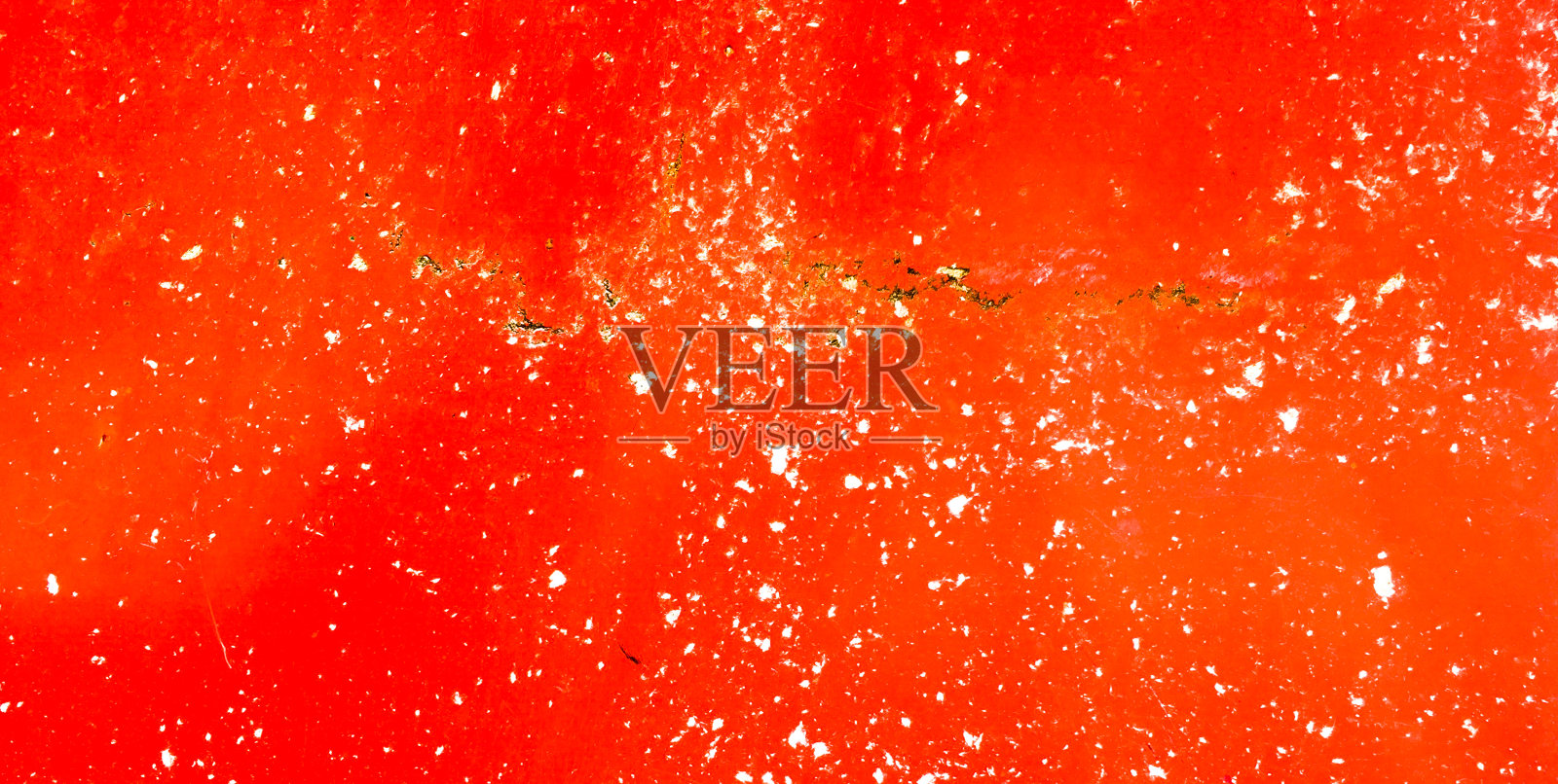 红色底色配白色污渍照片摄影图片