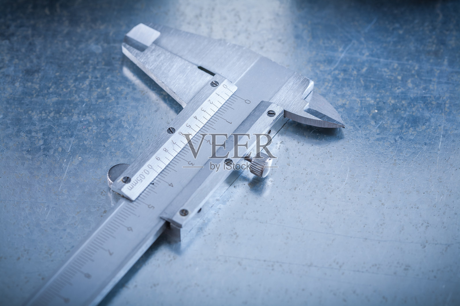 Trammel卡尺划痕金属背景水平视图照片摄影图片