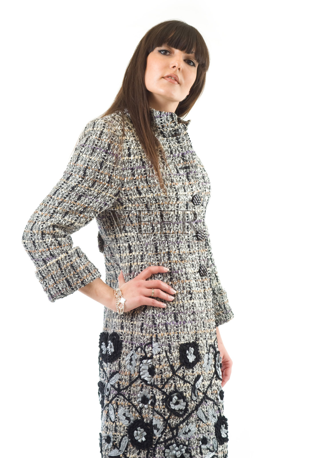 穿着灰色衣服的女人。照片摄影图片