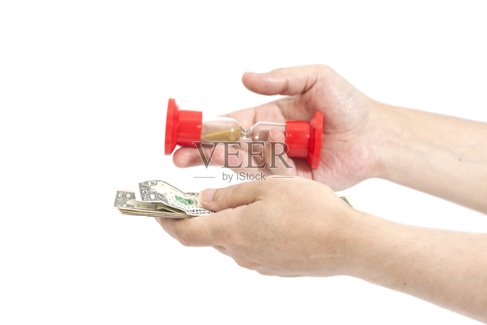 手握沙漏和美元的男人照片摄影图片