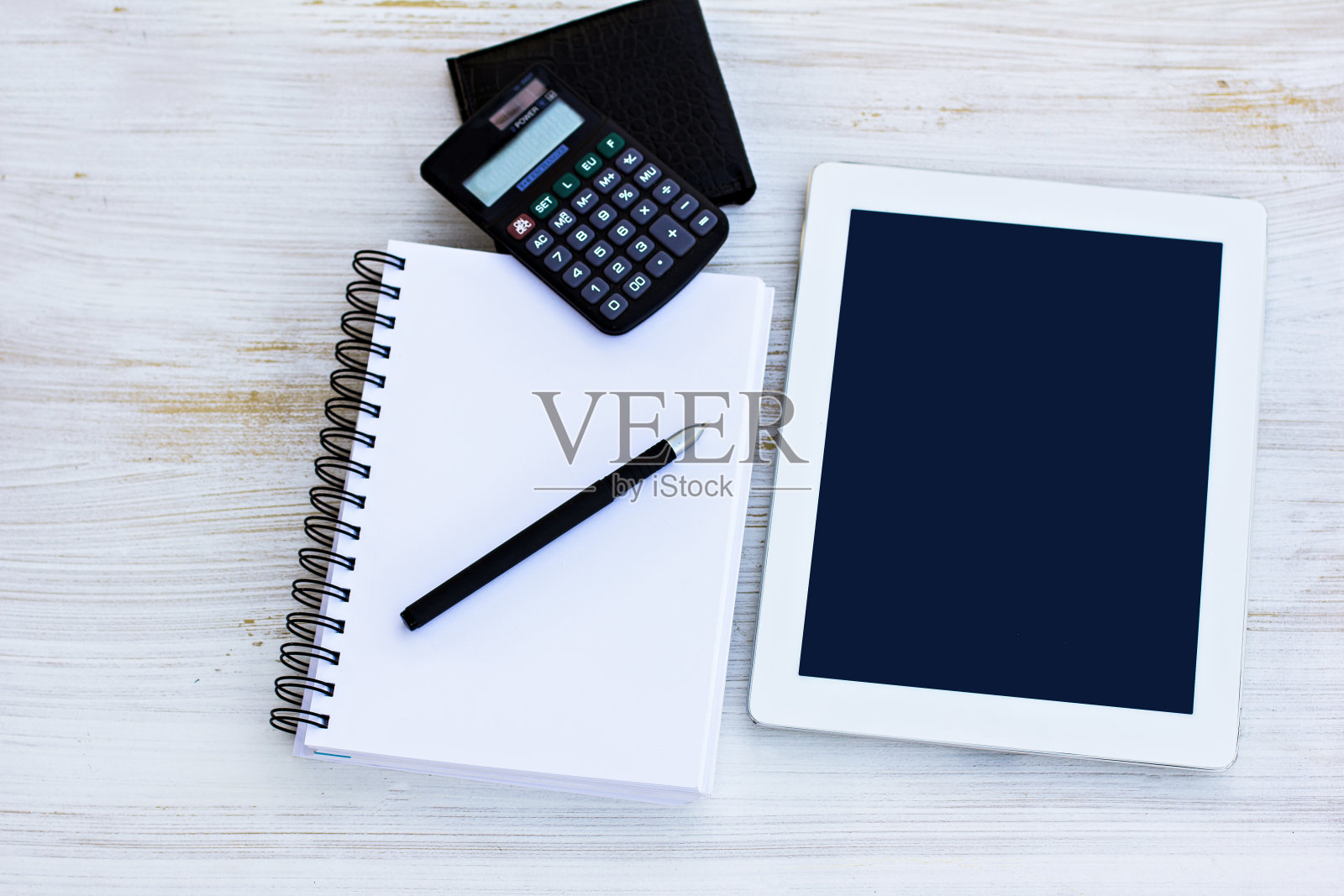 平板电脑，日记，计算器，钱包，笔照片摄影图片
