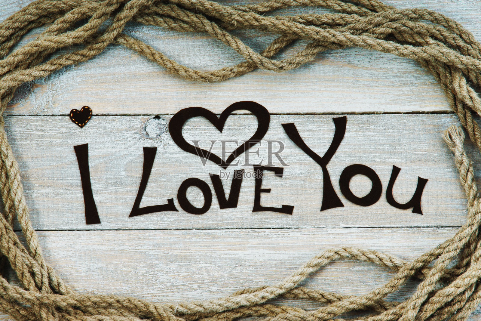 用绳子和“我爱你”字做成的框架照片摄影图片