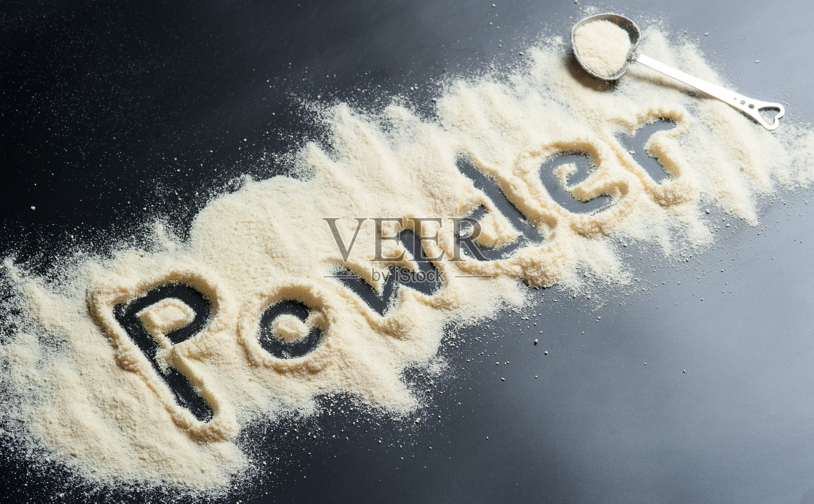 婴儿奶粉和勺子的特写照片摄影图片