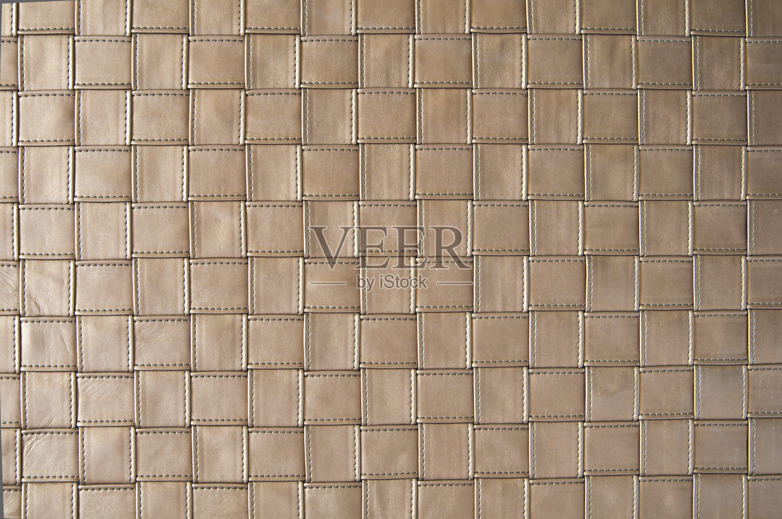 以皮革编织为背景照片摄影图片