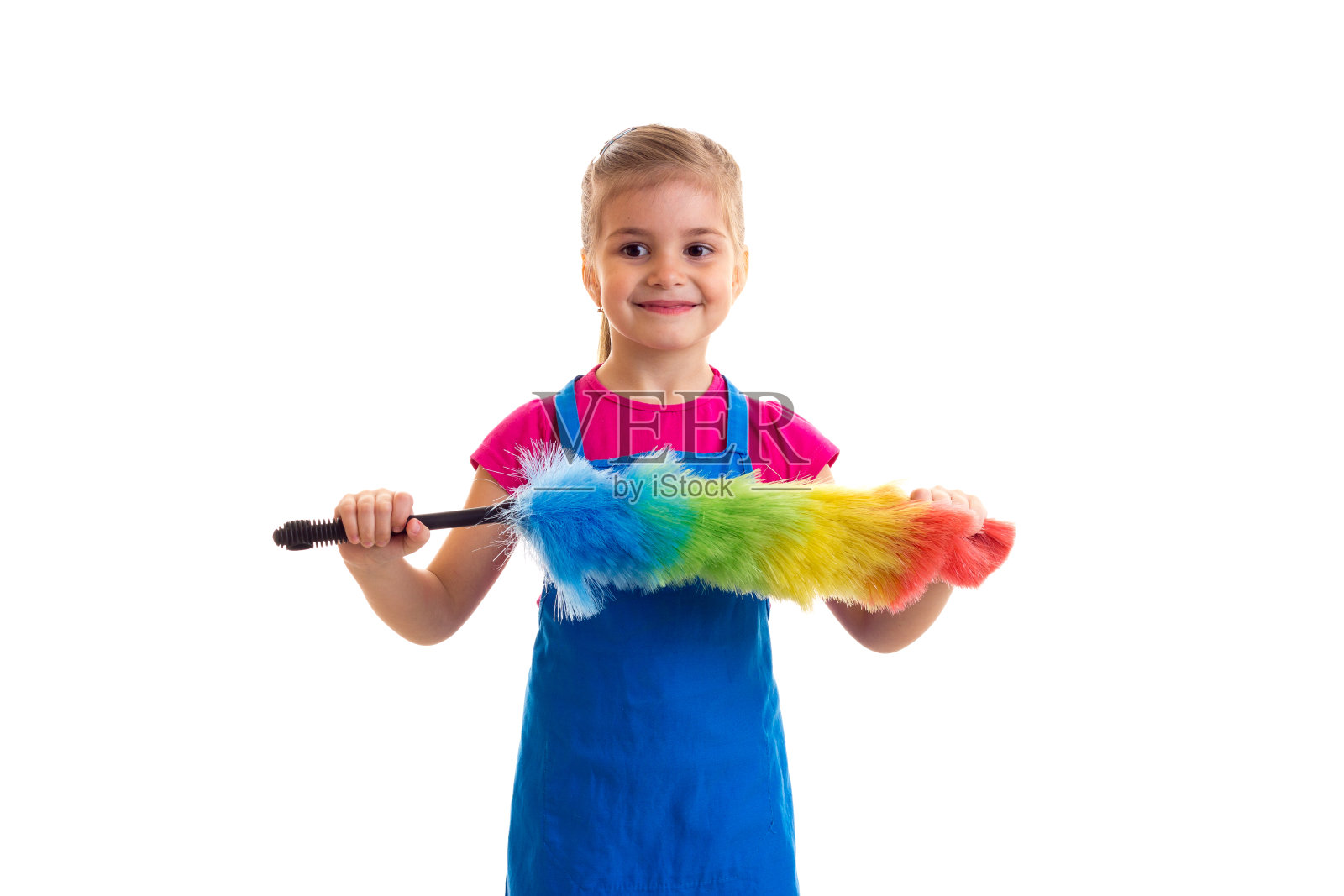 穿着围裙和抹布的女孩照片摄影图片