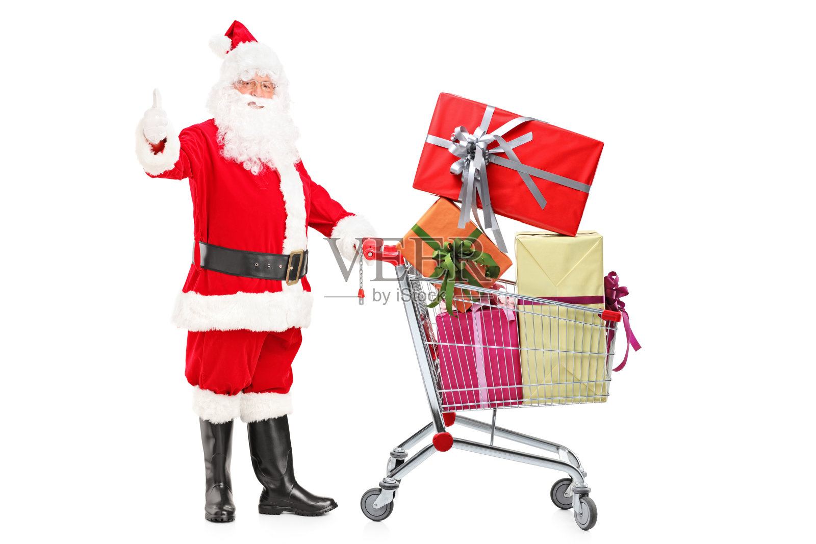 圣诞老人推着车，竖起大拇指照片摄影图片