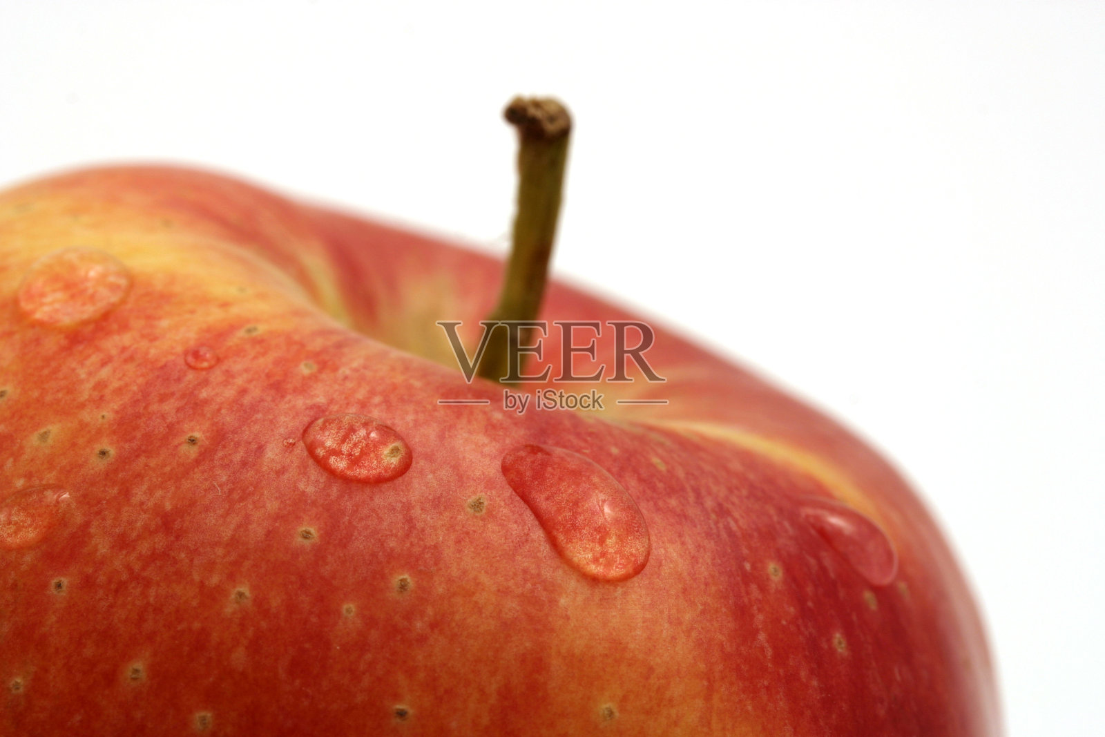 红苹果上水滴的特写照片摄影图片