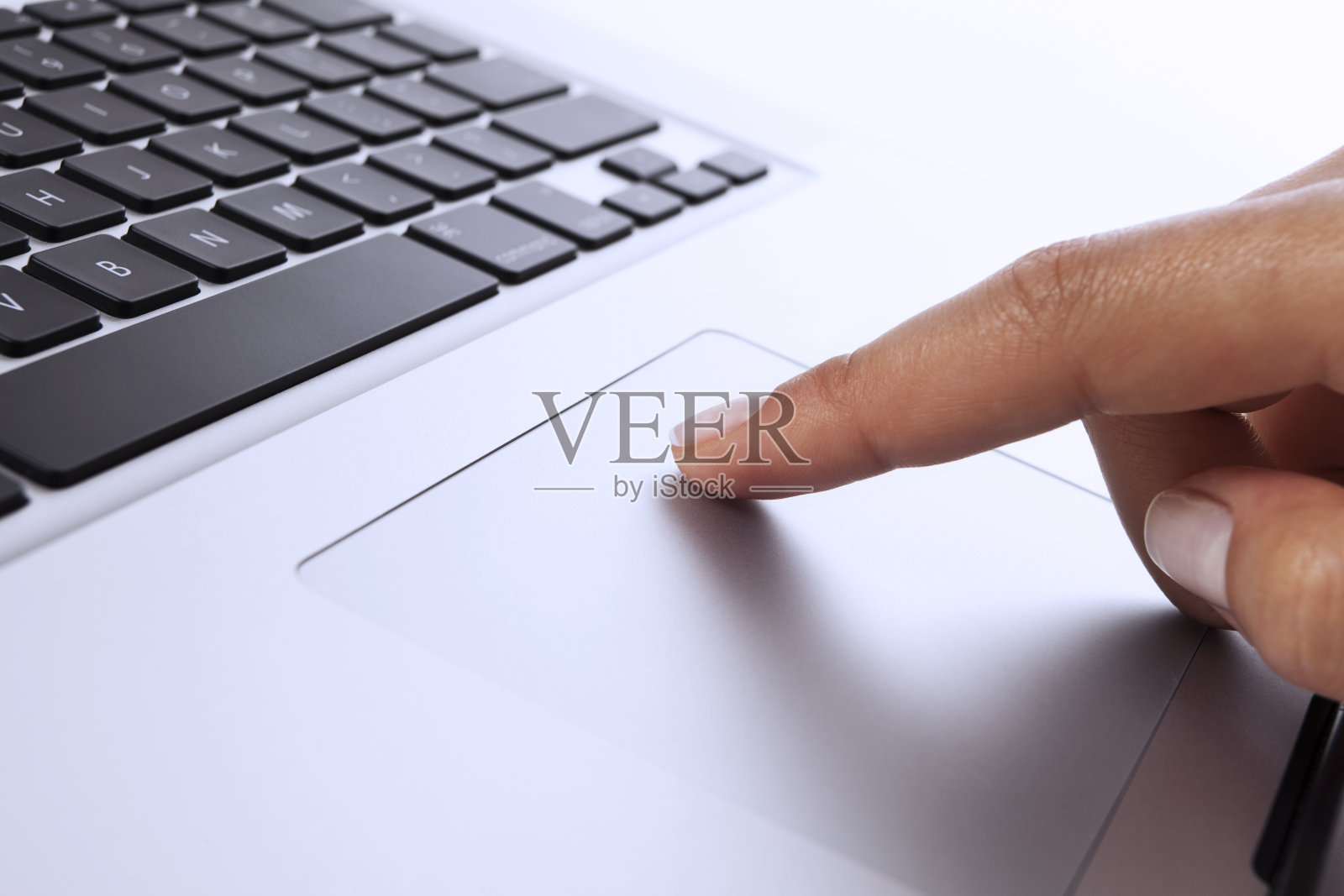 手指在触摸板照片摄影图片