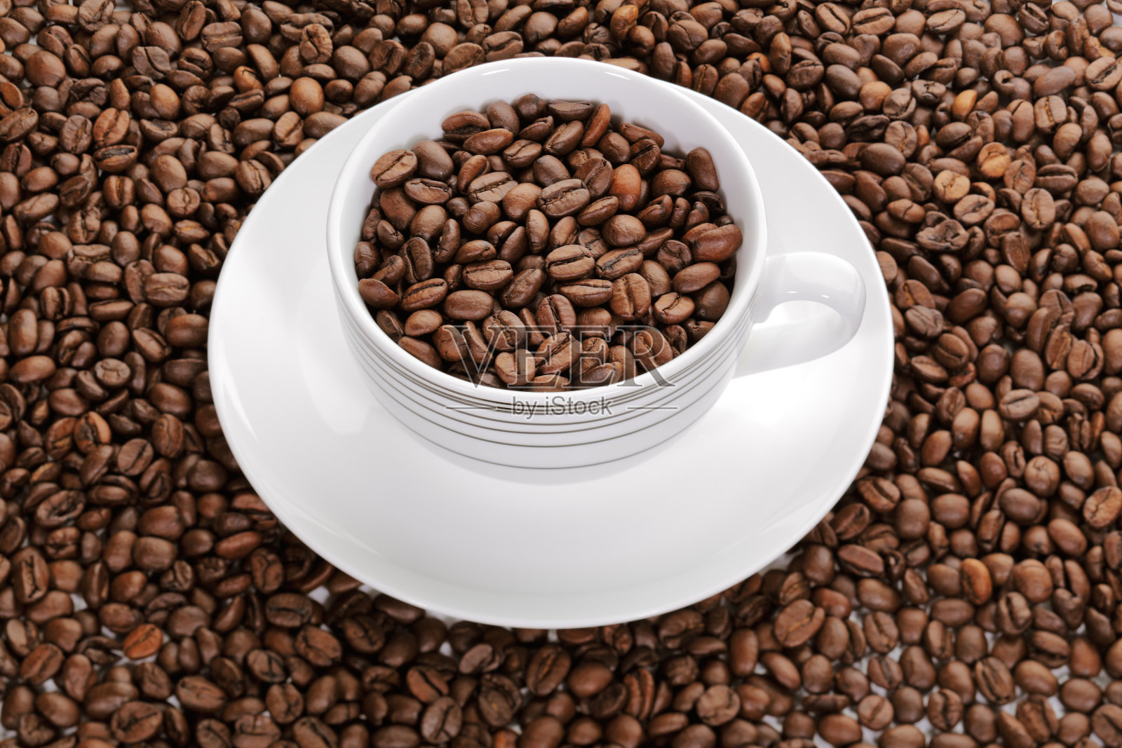 杯子里的咖啡豆照片摄影图片