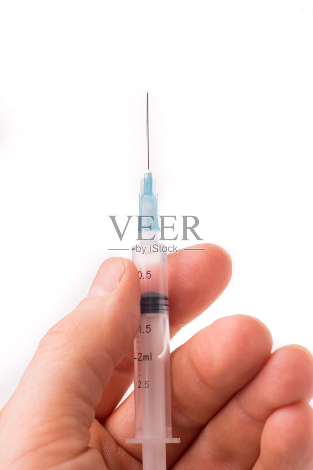 手持注射器照片摄影图片