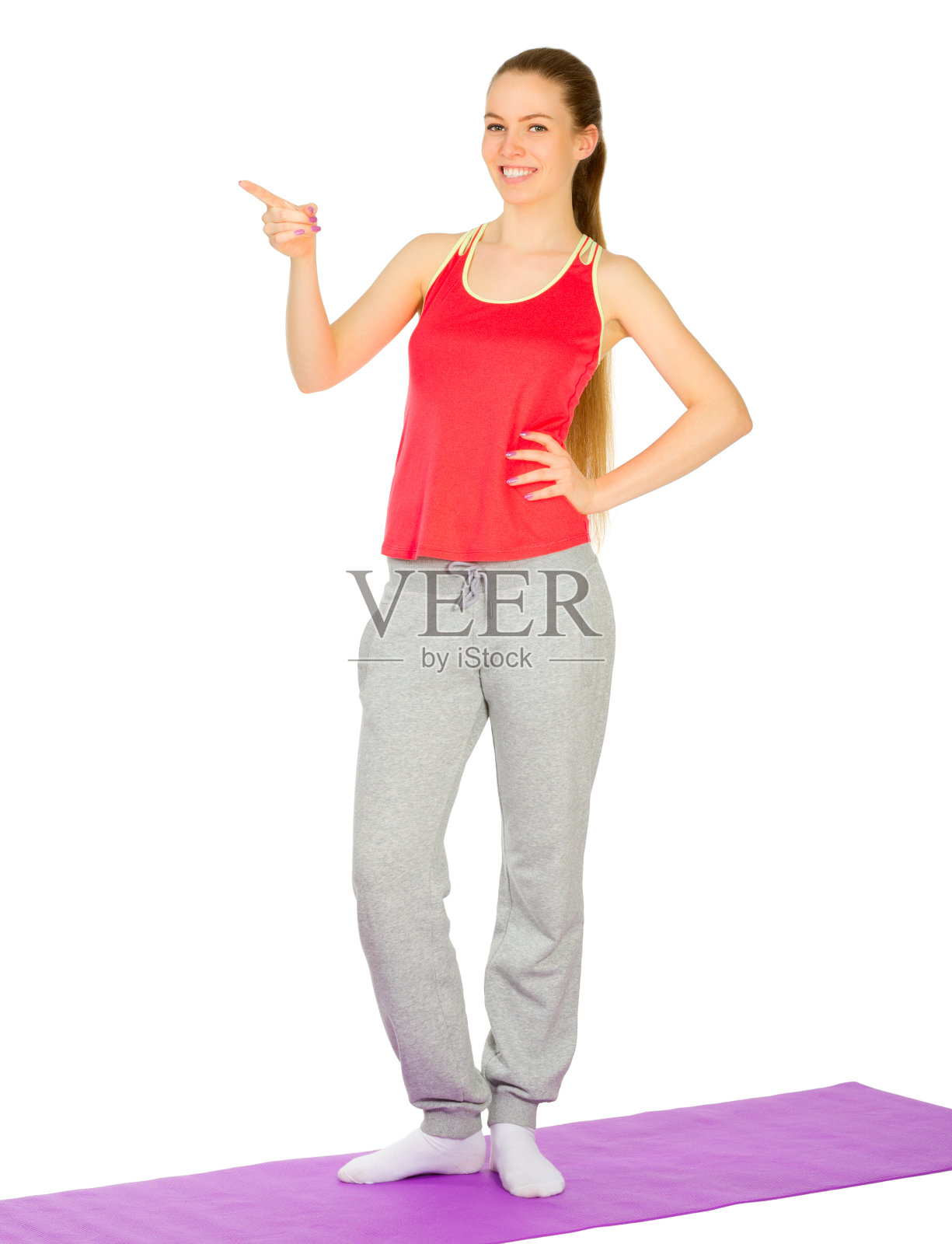 年轻的运动女孩显示指向手势照片摄影图片