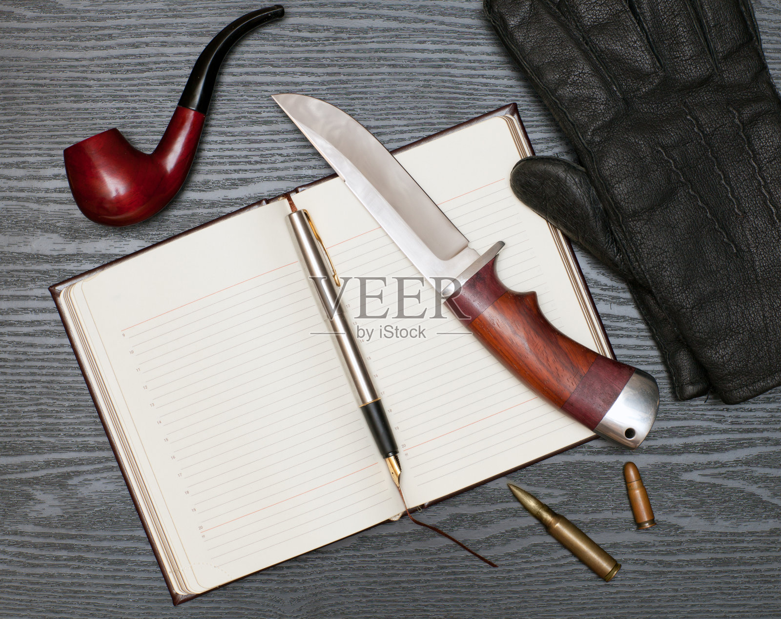 刀和笔记本照片摄影图片