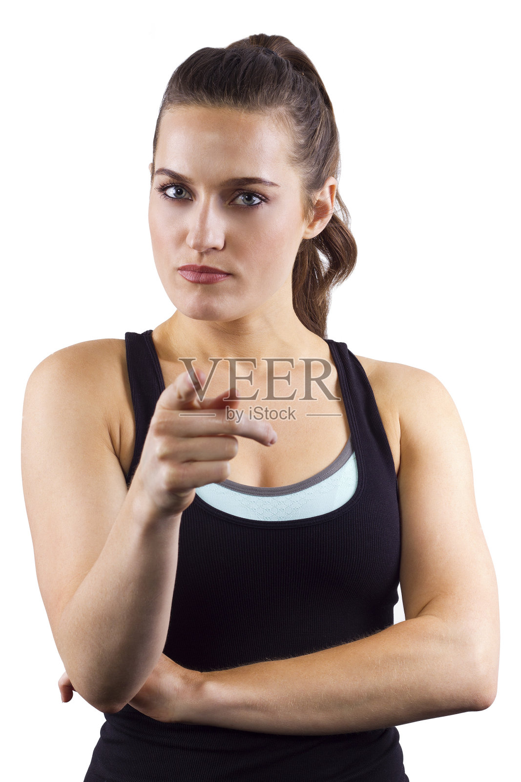 指向前方的健康年轻女健身教练照片摄影图片