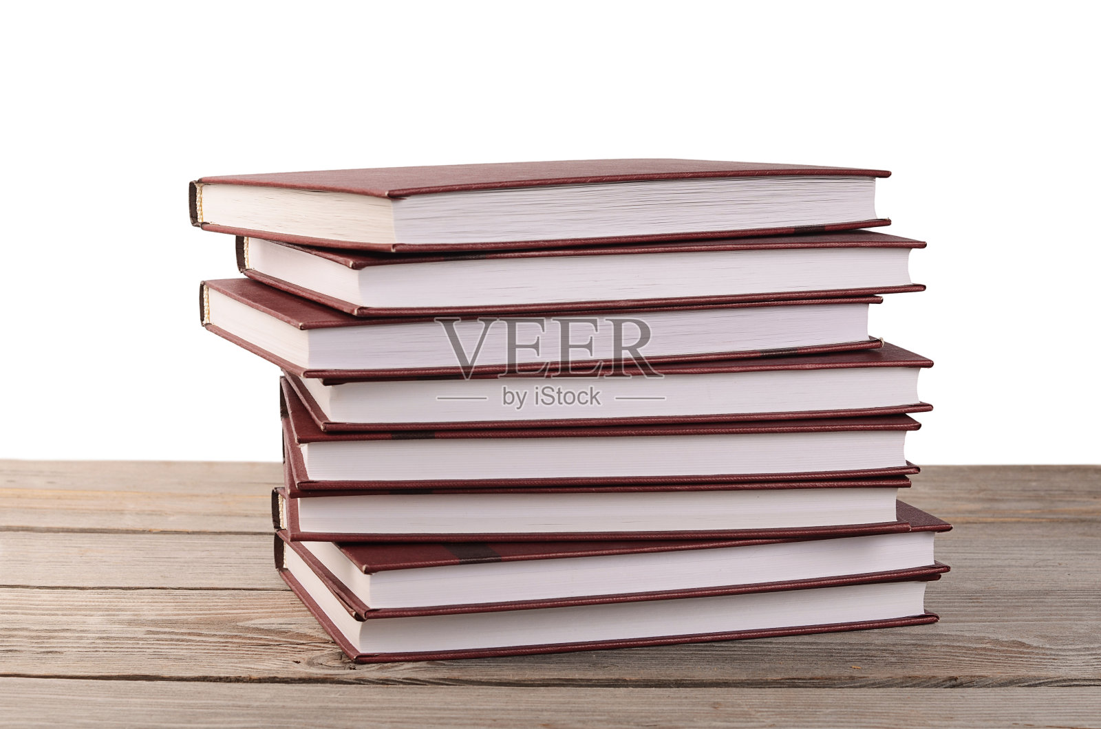 一堆书孤立在白色的照片摄影图片