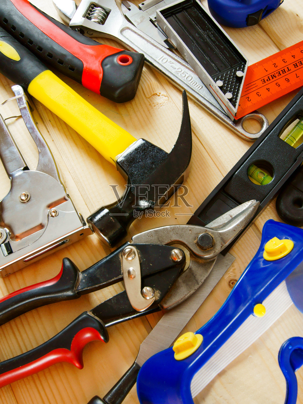 木制背景上的许多工作工具照片摄影图片